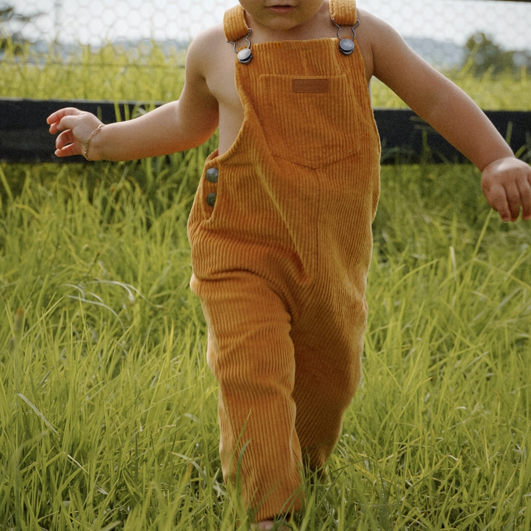 organic cotton corduroy long leg overalls in a orange for kids, toddlers and infants whole garment