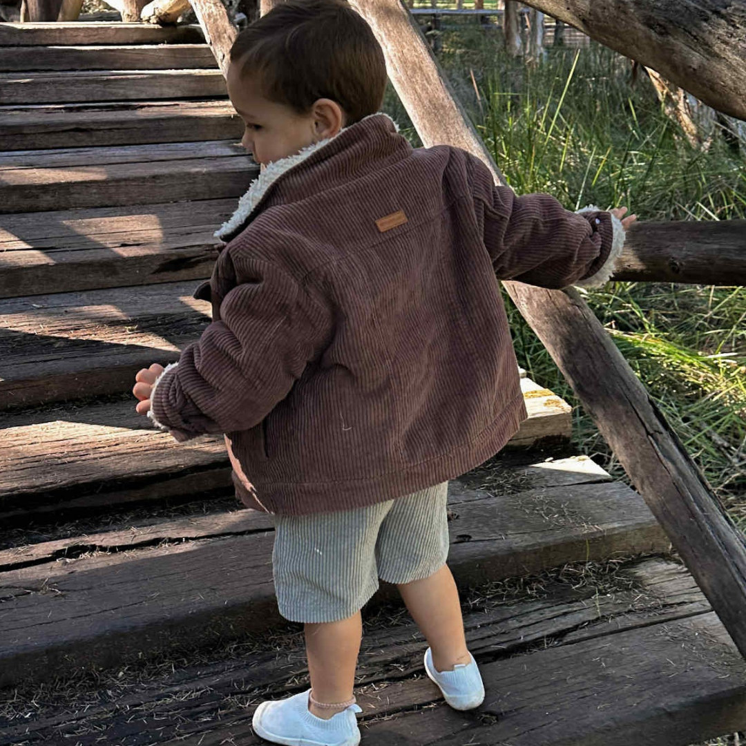 infants, toddlers and kids corduroy jacket with sherpa fleece lining. Backview