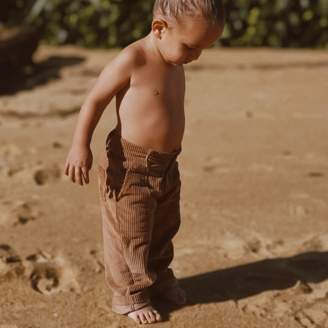 organic cotton corduroy pants in colour tan for infants, toddlers and kids front view