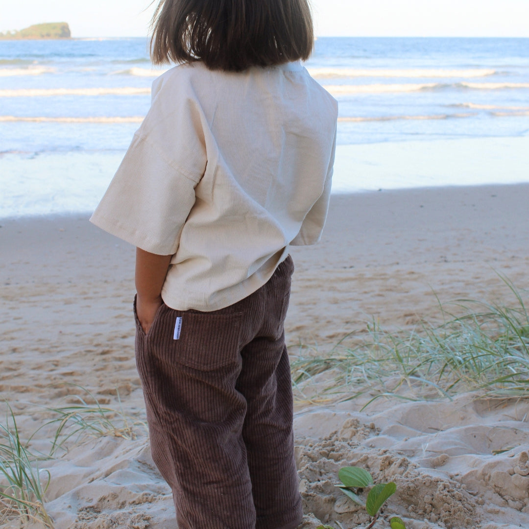 organic cotton corduroy pants in colour brown for infants, toddlers and kids back view